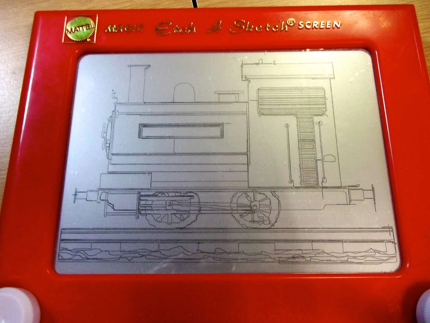 تصویری از یک اسباببازی Etch-a-Sketch